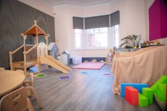 The interior of the Little Adventurers toddler room at Little Lodge Nursery in Leamington Spa